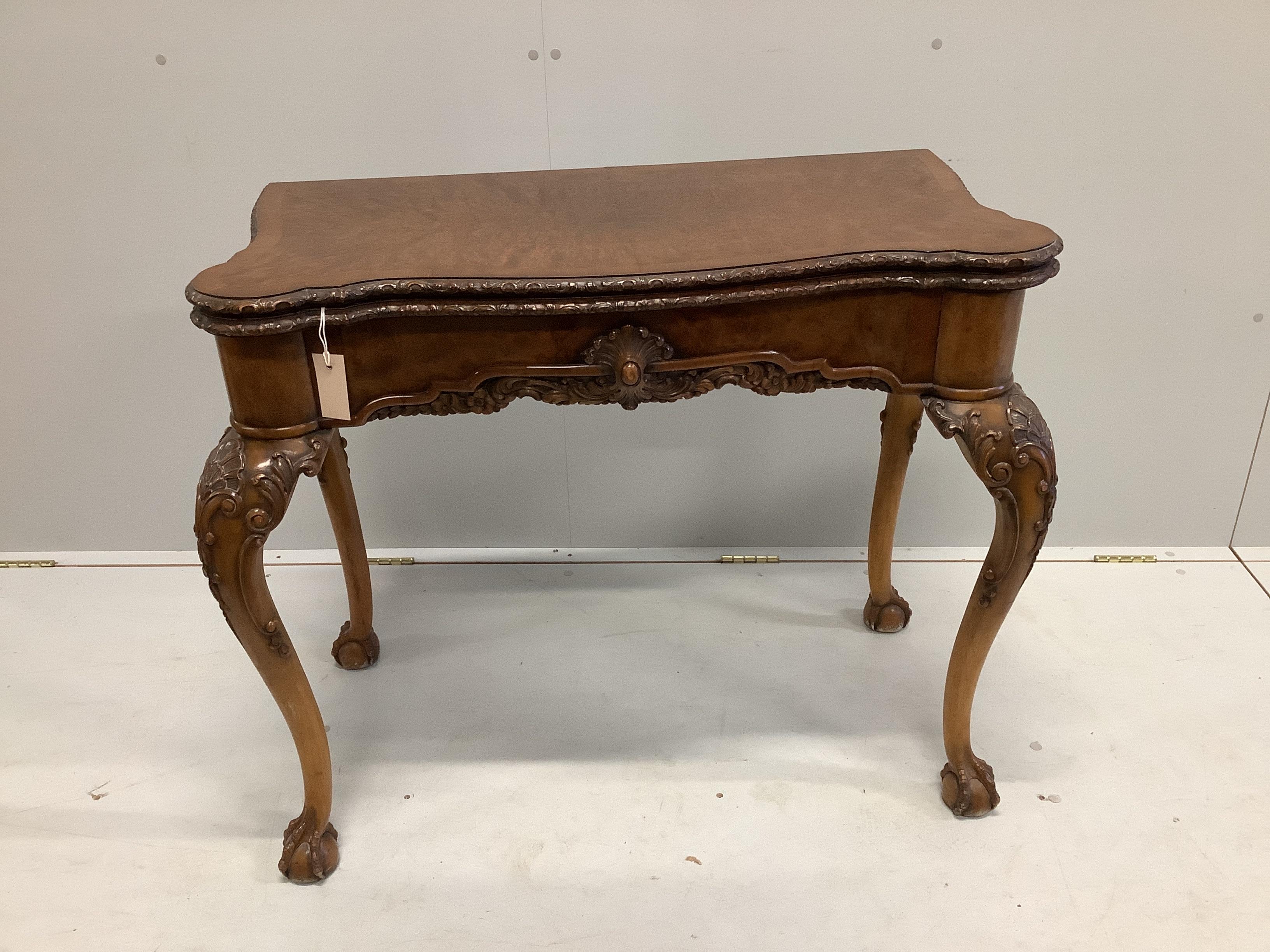 An early 20th century Chippendale Revival burr walnut folding card table, width 92cm, depth 48cm, height 78cm